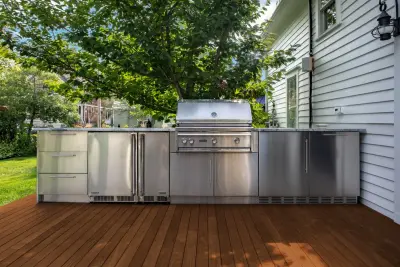 Simple Outdoor Cooking Space by Baine Contracting, Inc.