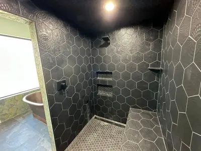 Stylish Modern Bathroom — Custom Home Builders project by Infinity Builders