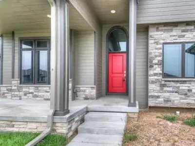 Crimson Entrance Bespoke Home — Custom Home Builders project by Empire Homes And Remodeling Inc.