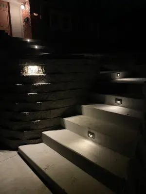 Updated stairs, retaining wall, and driveway by Dana Build And Design