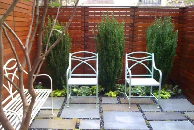 Upper East Side, NYC Townhouse Garden: Backyard, Bluestone Patio, Ipe Fence by Amber Freda Garden Design