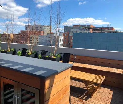 Bed-Stuy Rooftop Garden with Pergola and Custom Wood Features by Amber Freda Garden Design