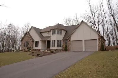 Fremont Design - Tudor with a Twist — Custom Home Builders project by Togo Custom Homes