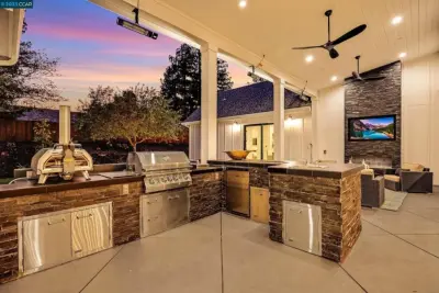 Outdoor Kitchens — Custom Home Builders project by REI Signature Homes Inc.