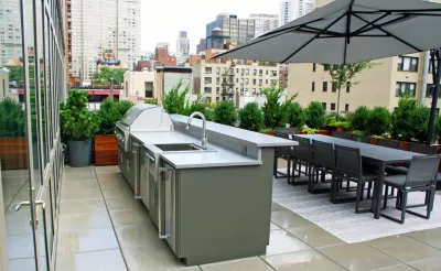 Midtown Custom Outdoor Kitchen - NYC Rooftop Garden Design — Landscape Design project by Amber Freda Garden Design in New York