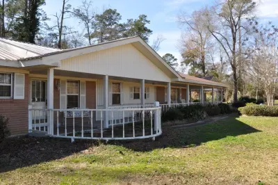 Verandas — Custom Home Builders project by Newton Log Homes Construction