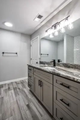 Modern Dual Bathroom Renovation — Custom Home Builders project by River Tree Homes LLC