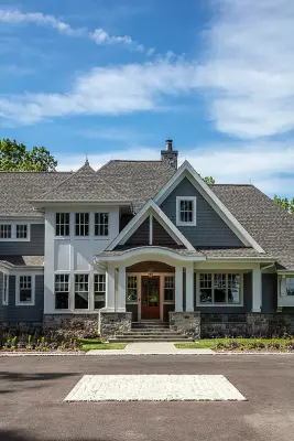 Lakeside Rustic Farmhouse — Custom Home Builders project by Mueller Homes Inc
