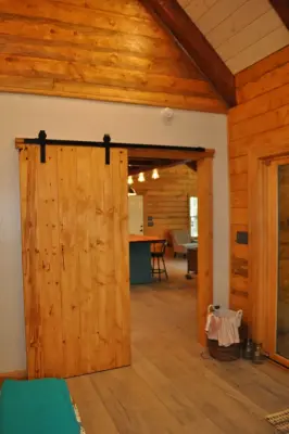 Shifting Entrances — Custom Home Builders project by Newton Log Homes Construction
