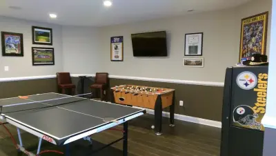 Athletic-Inspired Basement Renovation Olney MD by Evergreen Building Group, LLC.