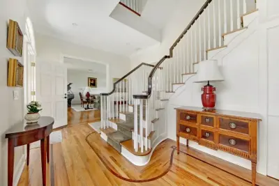 Handrail Design without Newels — Custom Home Builders project by Elite Construction Of Jax, Inc.