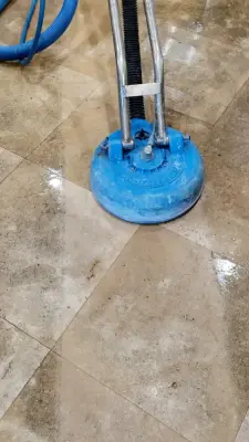 Instantly Restoring a Travertine Floor by Removing Years of Embedded Dirt — Tile & Stone Installation Services project by The Beautiful Stone Company