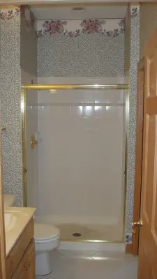 Showers: The Transformation by Heinrichs Custom Tile And Stone