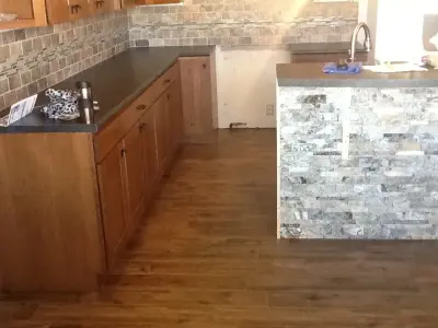Elgin, NE Kitchen Island, Flooring, and Backsplash Project by Man N Mountain-Tile & Stone