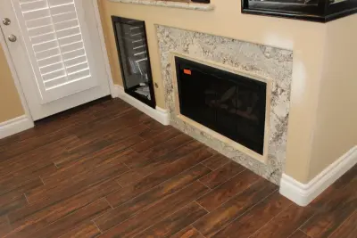 Botanical Porcelain Wood Flooring — Tile & Stone Installation Services project by Quality Stone Concepts