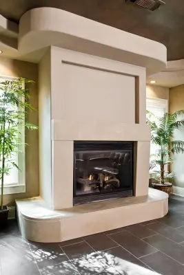 Bespoke Concrete Fireplace Mantel with Curved Hearth — Tile & Stone Installation Services project by Turning Stone Design