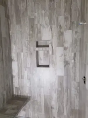 personalized shower — Tile & Stone Installation Services project by Harris Flooring & More