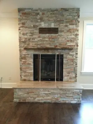 Layered Stone Ledger Panel — Tile & Stone Installation Services project by Quality Stone Concepts