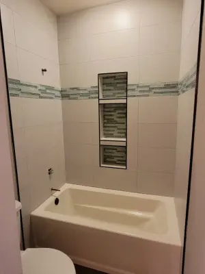 tub surround — Tile & Stone Installation Services project by Harris Flooring & More