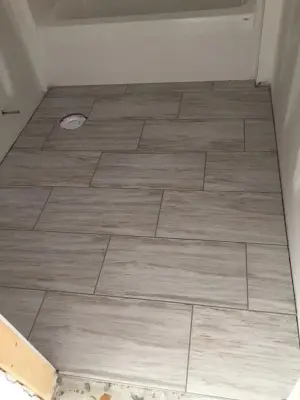 12x24 Soft Taupe Bathroom by Wells Tile Company
