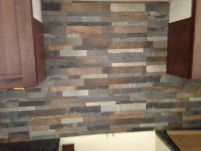 6x24 Rocky Gold Porcelain Tile Backsplash by Wells Tile Company