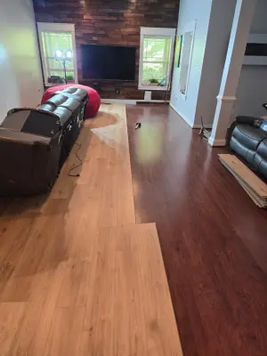 Basement Luxury Vinyl Tile Flooring — Tile & Stone Installation Services project by The Professionals