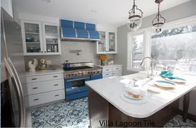 Cottage Kitchen Featuring Blue Cement Tile from Villa Lagoon in Country Living Magazine — Tile & Stone Installation Services project by Villa Lagoon Tile