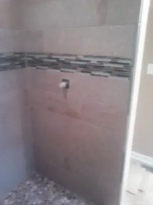 personalized shower enclosure — Tile & Stone Installation Services project by The Professionals