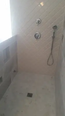 Delafield Two Showers — Tile & Stone Installation Services project by Heinrichs Custom Tile And Stone