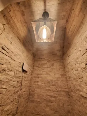 Wine Storage Room — Tile & Stone Installation Services project by Epic Custom TileWorks LLC