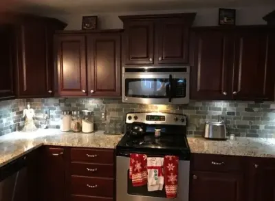 Norfolk, NE Kitchen Tile and Backsplash — Tile & Stone Installation Services project by Man N Mountain-Tile & Stone