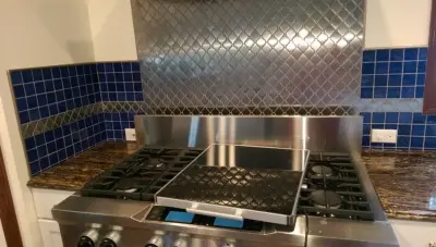 Contemporary Metal Backsplash — Tile & Stone Installation Services project by Davey Tile