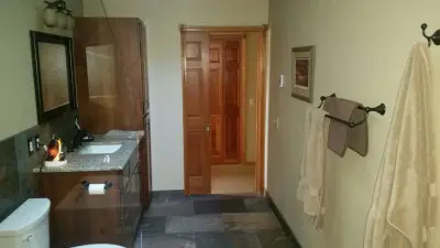 Contemporary Rustic Bath and Wet Room — Tile & Stone Installation Services project by Progressive Interiors, LLC