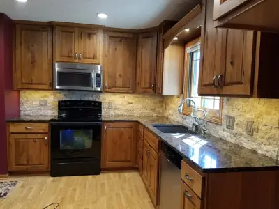 Natural Ledgerstone Backsplash Installation in Wisner, NE — Tile & Stone Installation Services project by Man N Mountain-Tile & Stone