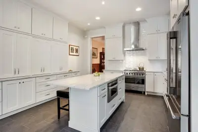 NOLA White Kitchen — Tile & Stone Installation Services project by Triton Stone
