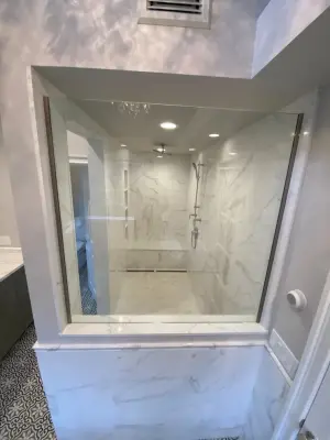 Radiant White Bathroom Renovation — Tile & Stone Installation Services project by DBA D Lopez Tile And Marble Works