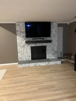 Stackstone Hearth — Tile & Stone Installation Services project by DBA D Lopez Tile And Marble Works