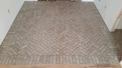 slim brick facing flooring — Tile & Stone Installation Services project by Heinrichs Custom Tile And Stone