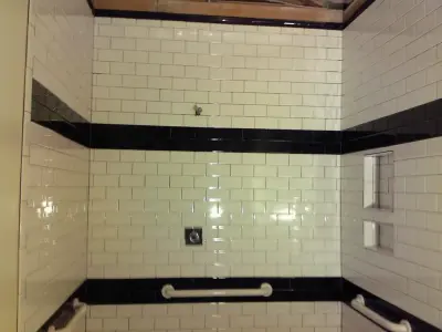 Karn's subway bathing facility — Tile & Stone Installation Services project by Wells Tile Company
