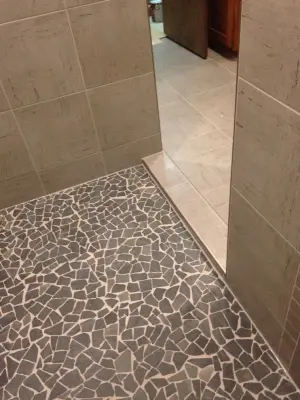 Master Bathroom Linear Drain Installation in Bloomfield — Tile & Stone Installation Services project by Man N Mountain-Tile & Stone