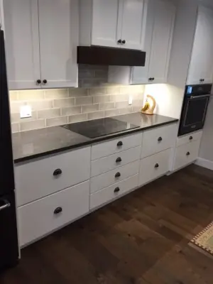 Brunswick, NE White Kitchen Transition — Tile & Stone Installation Services project by Man N Mountain-Tile & Stone