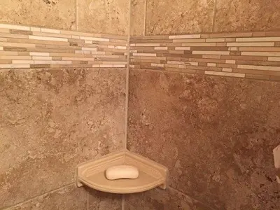 Renovated Bathroom with Tub Surround in Norfolk, NE — Tile & Stone Installation Services project by Man N Mountain-Tile & Stone