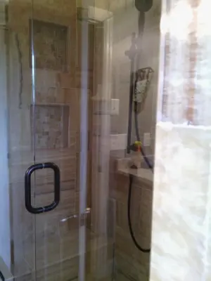 Shower with accessibility — Tile & Stone Installation Services project by Tic Tac Tile Co.