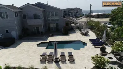 Walnut Travertine and R.Impero Porcelain Paver Initiative — Tile & Stone Installation Services project by NT Pavers