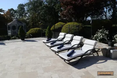 Connecticut Travertine Outdoor Space — Tile & Stone Installation Services project by NT Pavers