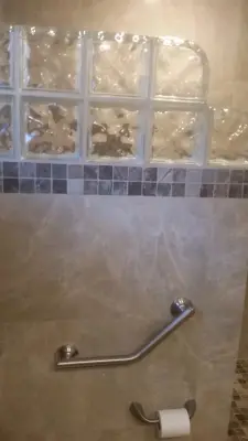 Ukiah West: Shower, Flooring, and Vanity Upgrade — Tile & Stone Installation Services project by Woodall Ceramic Tile