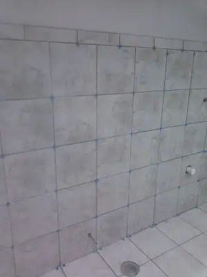 business restrooms, commercial endeavors — Tile & Stone Installation Services project by The Professionals