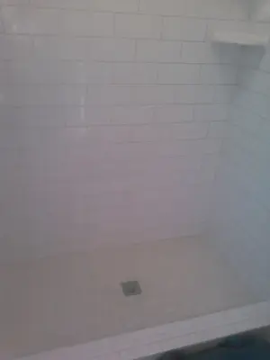 Numerous Tiled Showers — Tile & Stone Installation Services project by The Professionals