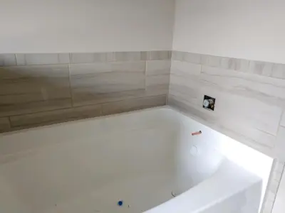 Willow Park bathing area — Tile & Stone Installation Services project by Wells Tile Company