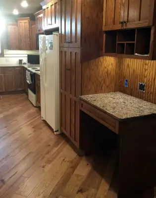 Wisner, NE Wood Flooring and Backsplash Project — Tile & Stone Installation Services project by Man N Mountain-Tile & Stone